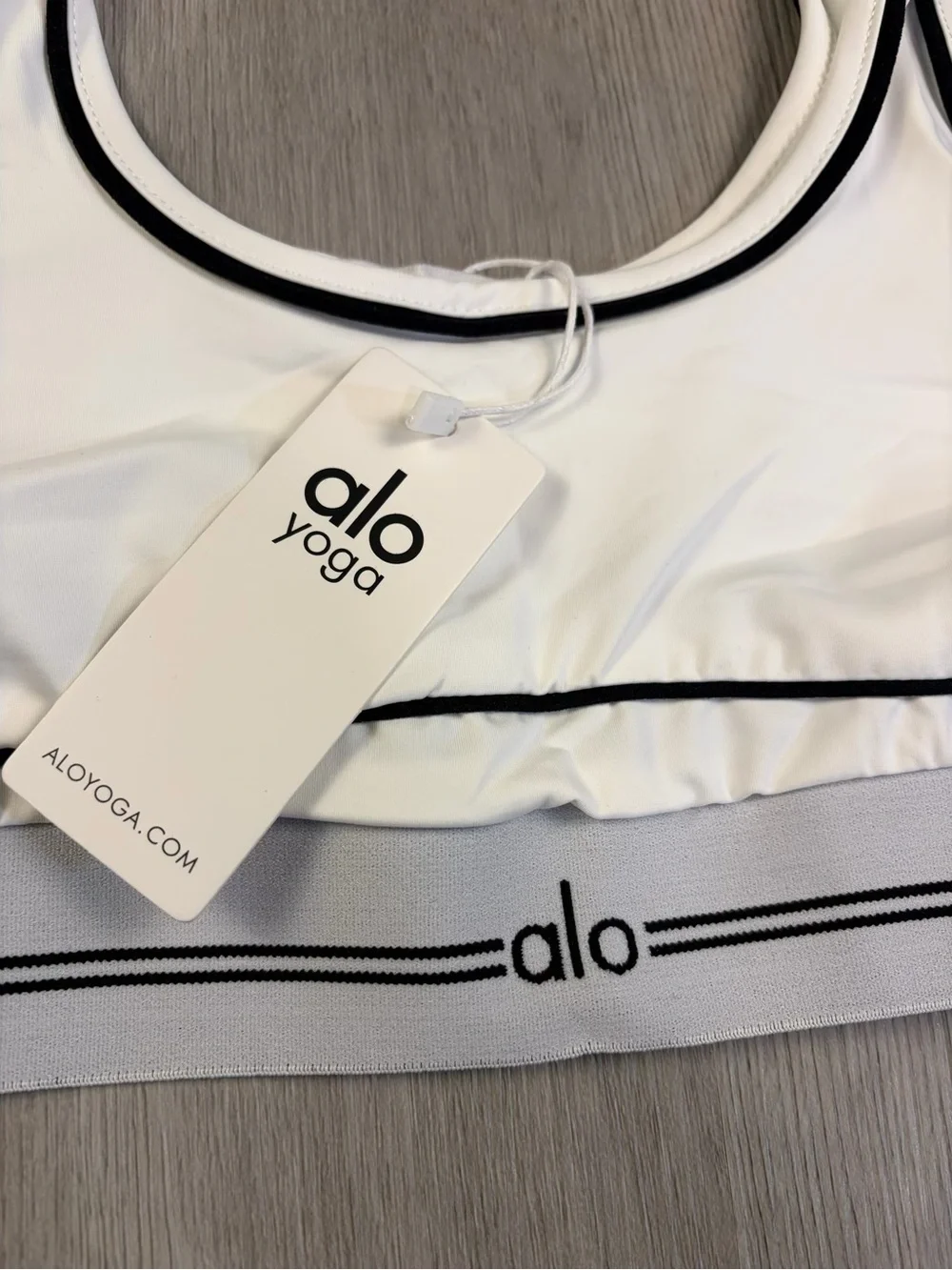 ALO Yoga White Sports Bra with Black Piping